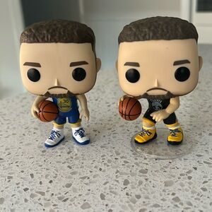 Two Golden State Warriors Funko Pop figures, Stephen Curry